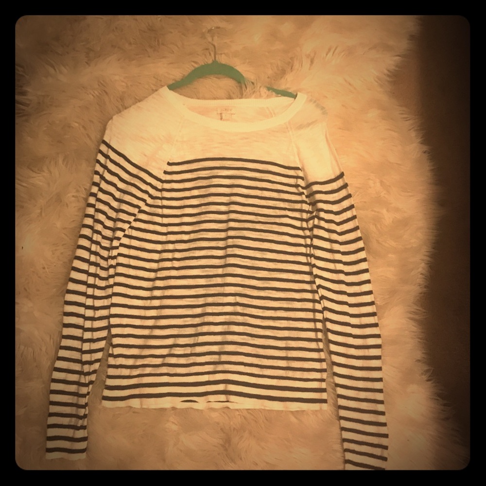 A JCREW sweater white with black stripe. Size S